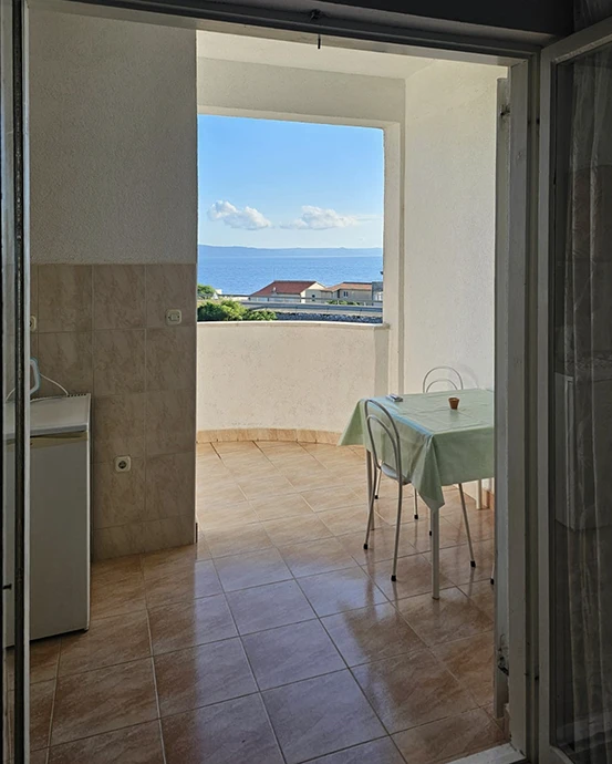 Apartments Marija and Frane Mravičić, Tučepi - balcony with sea view